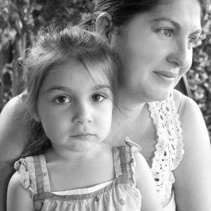 Sanela Omerovich poses with her 3-year-old daughter, Analisa. Sanela and her husband, part of the great Roma diaspora, fled the former Yugoslavia in the early 1990s. In Portland, they still face anti-Roma prejudice.