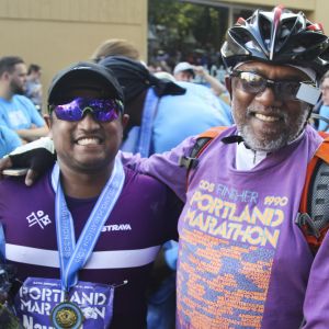 Rohith Gunawardena, right, poses with his son, Navindra after they finished the 2016 Portland Marathon. Rohith, who is now retired, originally emigrated from Sri Lanka to attend graduate school in Oregon and he completed his first marathon in 1994.