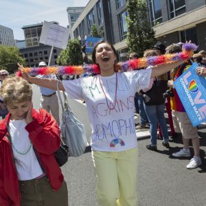 Mariam Rija, right, and her mother, Manijeh, left, upset by the shooting at an Orlando, Fl. nightclub, march in the 2016 Portland Pride Parade. Manijeh said she never imagined as a younger woman in Iran that she would one day march in a Pride Parade, but she and her daughter (who is not gay) are passionate about human rights and equality.