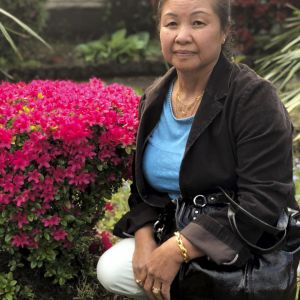 Keota Vongsavath fled Laos while pregnant with her third child, crossing the Mekong River and taking refuge in a Thai refugee camp before making it to the U.S. That child grew up to take this photo of his mother, and says she is "our family hero."