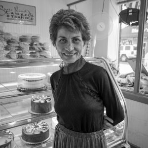 Manijeh, an immigrant from Iran, smiles while attending a party. She lives in Beaverton, Oregon.
