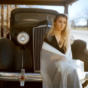 Because of her fair skin, many people assume Oksana is an American — until they hear her speaking English with an accent. The Ukrainian immigrant, who works as a model, said she came to the United States "in search of a better life for me and my family. ... Even though I'm unhappy to be away from my family, I am still working towards citizenship, because what I have to do is bigger than me."